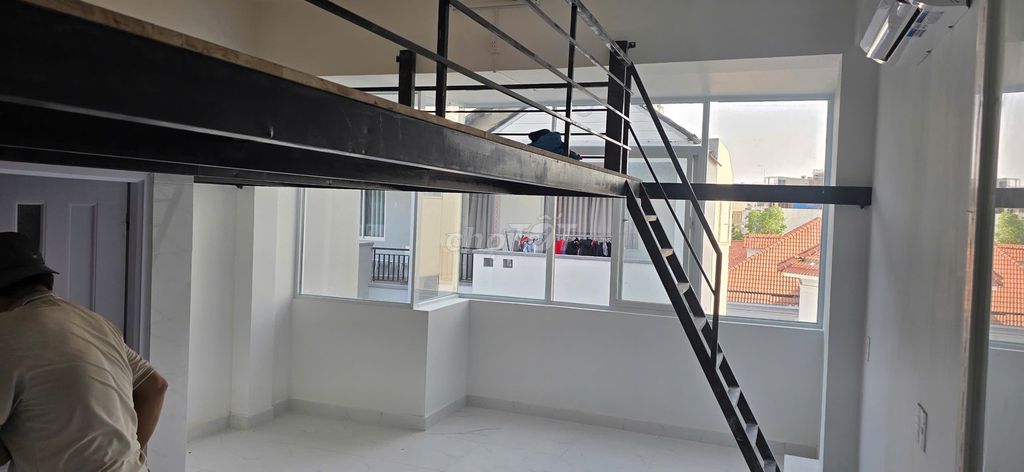 The balcony's got a beautiful panorama window.