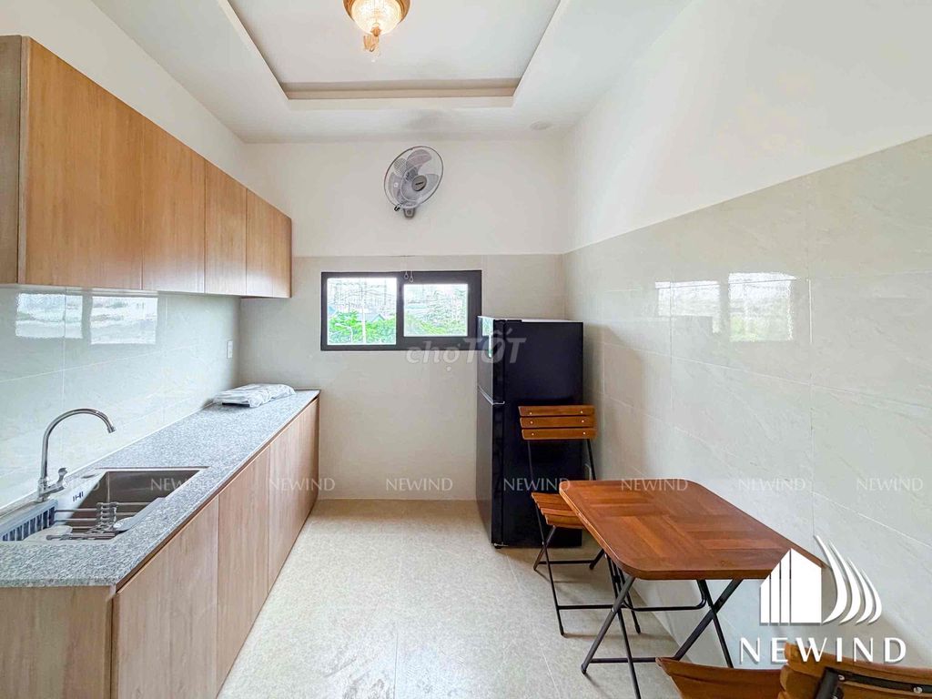 The studio system, a large window bedroom full of furniture.