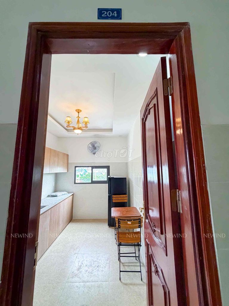 The studio system, a large window bedroom full of furniture.