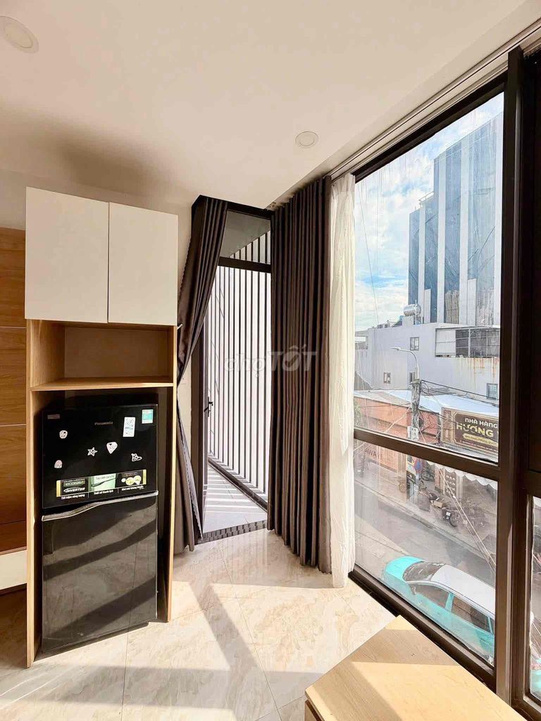 The new apartment is full of empty furniture with clean elevators in it right now.