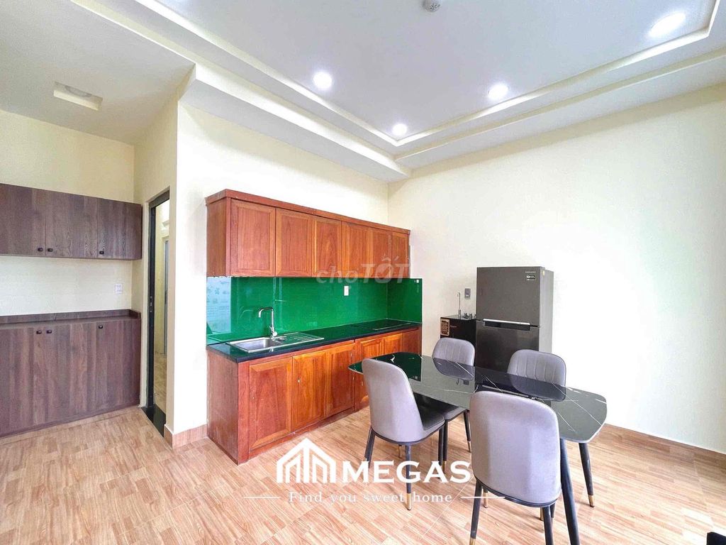 Open the studio apartment. One bedroom, right here.