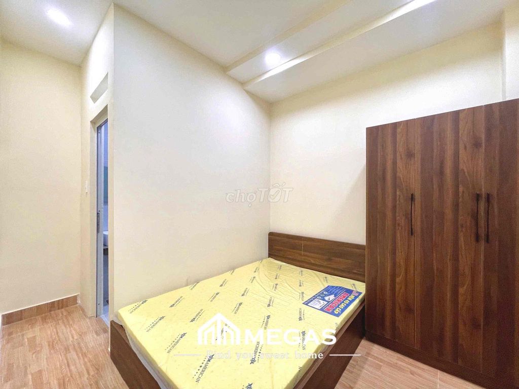 Open the studio apartment. One bedroom, right here.