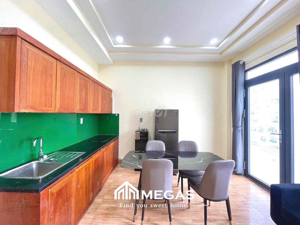Open the studio apartment. One bedroom, right here.