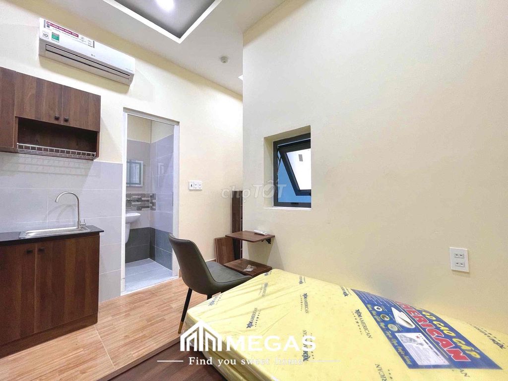 Open the studio apartment. One bedroom, right here.