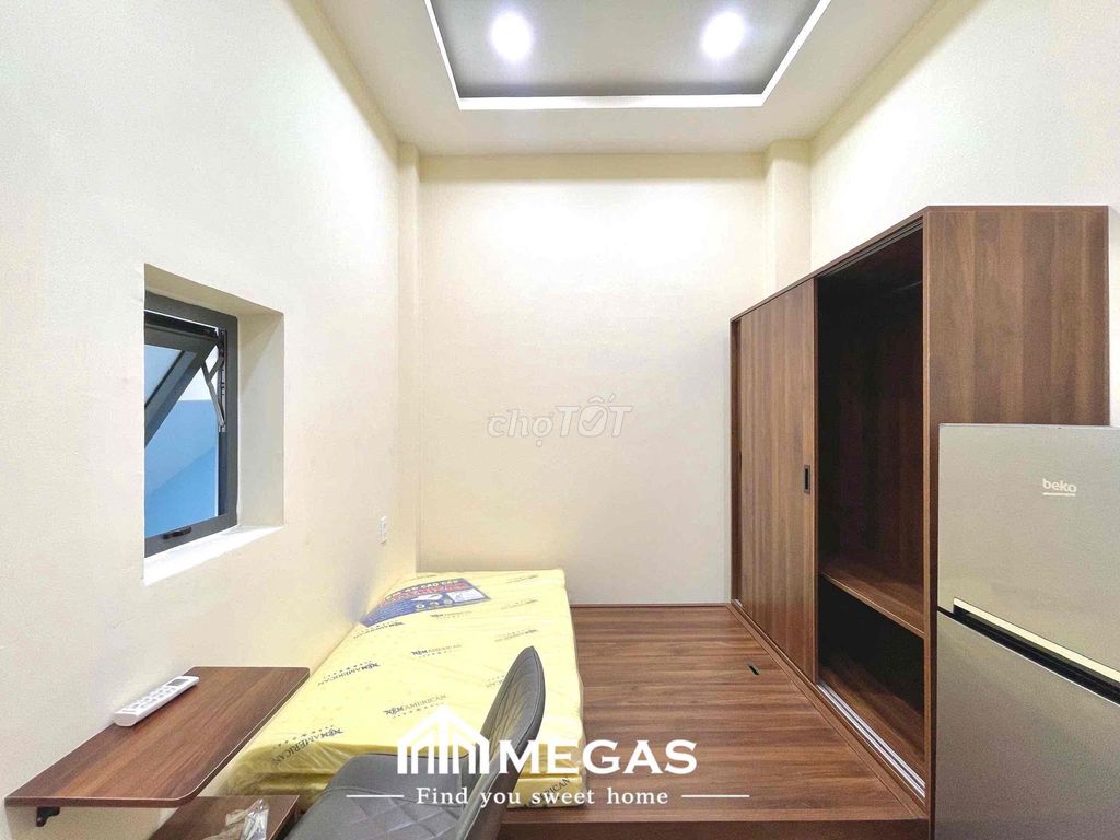 Open the studio apartment. One bedroom, right here.