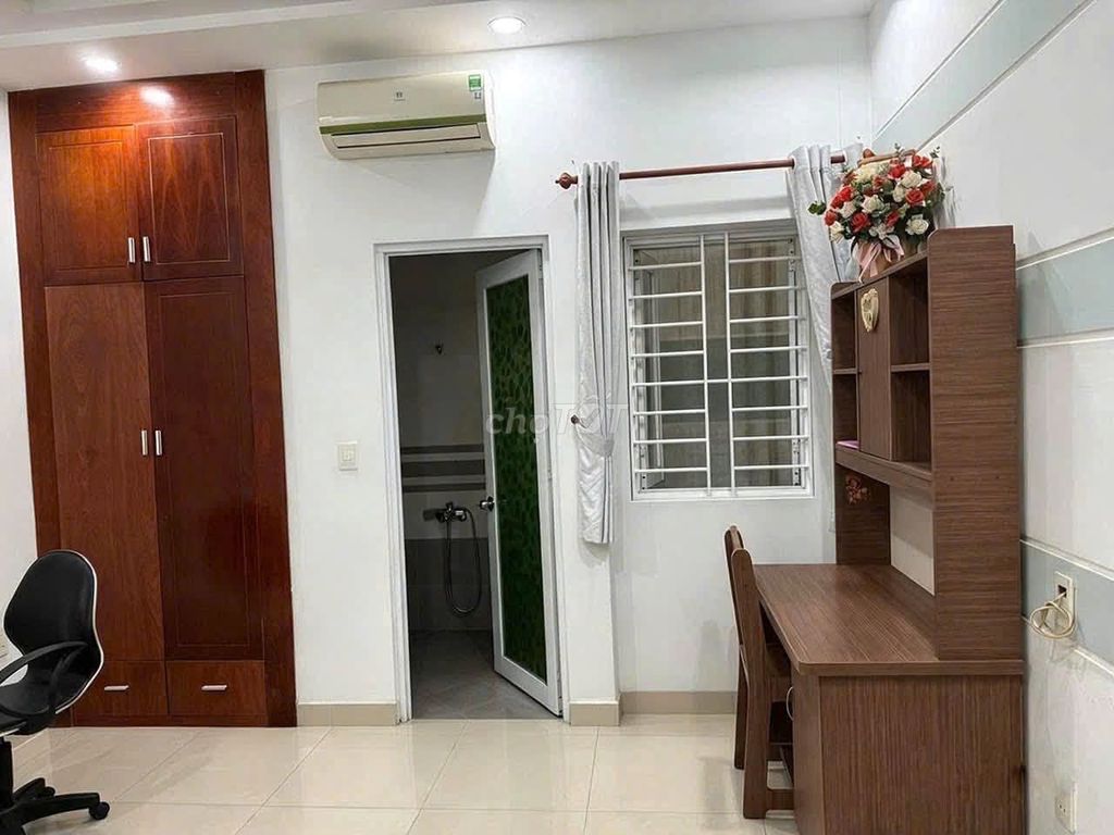 The original two bedrooms, two bathrooms in front of the house, maybe a little 730, Q's. Phú Nhuận