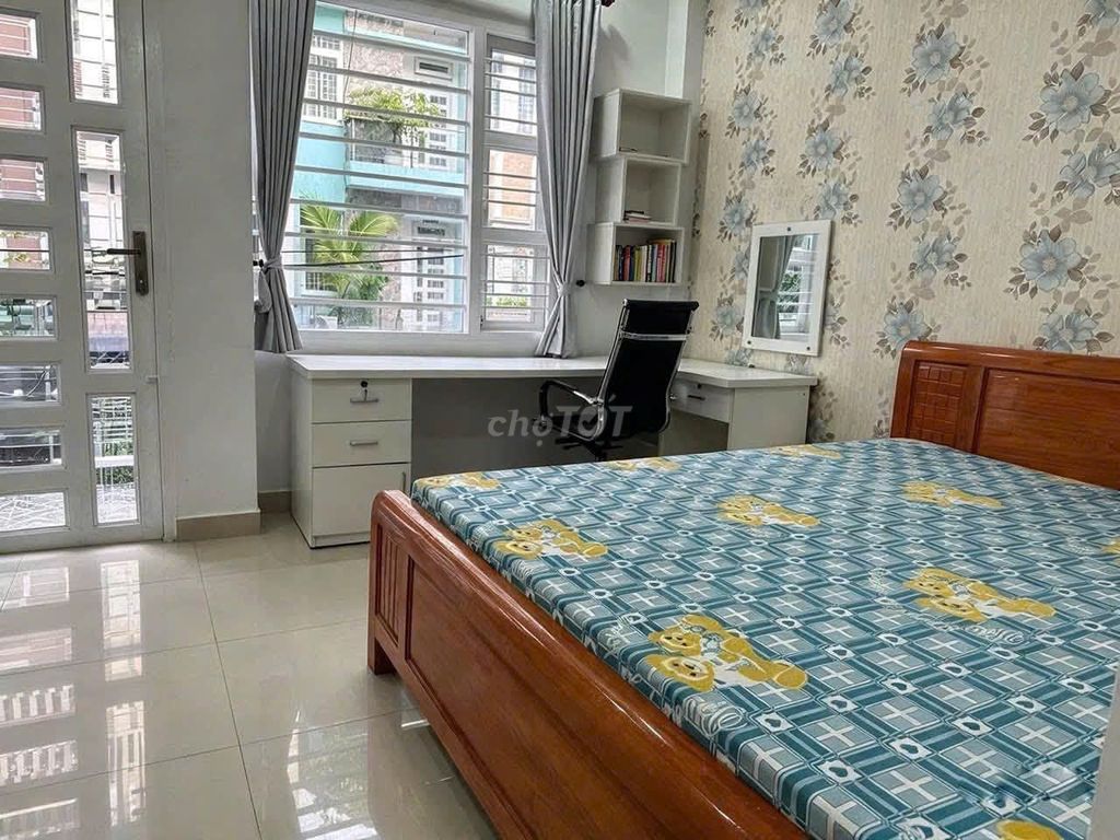 The original two bedrooms, two bathrooms in front of the house, maybe a little 730, Q's. Phú Nhuận
