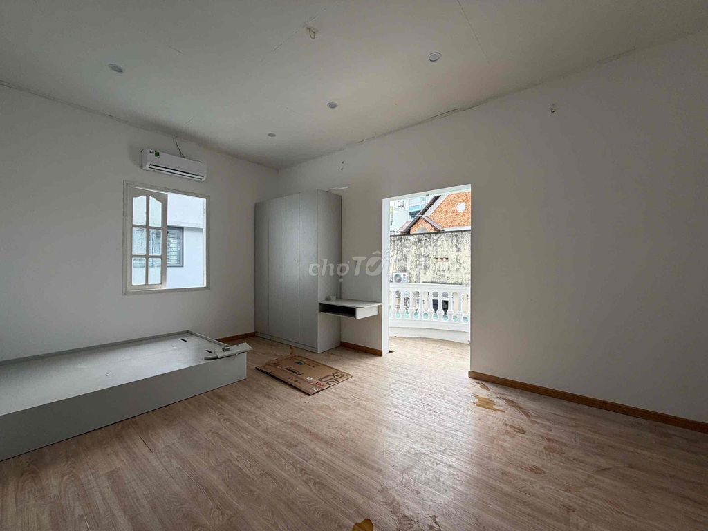 A wide new brand-new place full of furniture near a small bridge cost