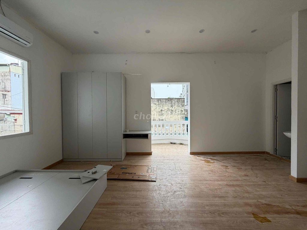 A wide new brand-new place full of furniture near a small bridge cost