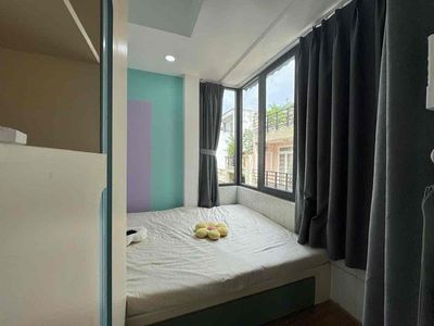 The two bedrooms are right near the Viettel building, democratic circle, via District 1.