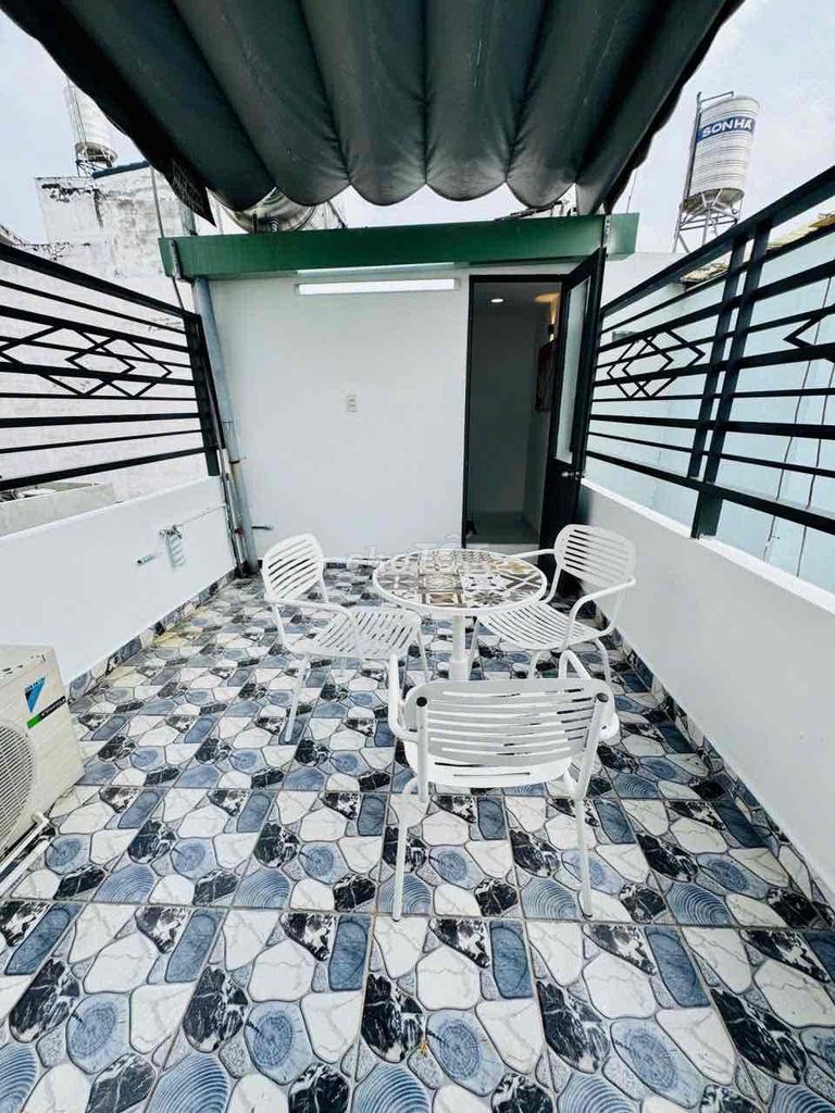 New house built two rooftops with furniture.