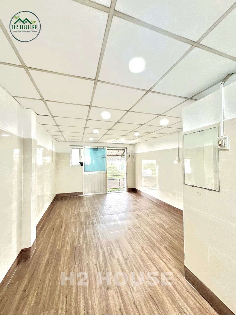Rent a balcony with a window the size of an airport.