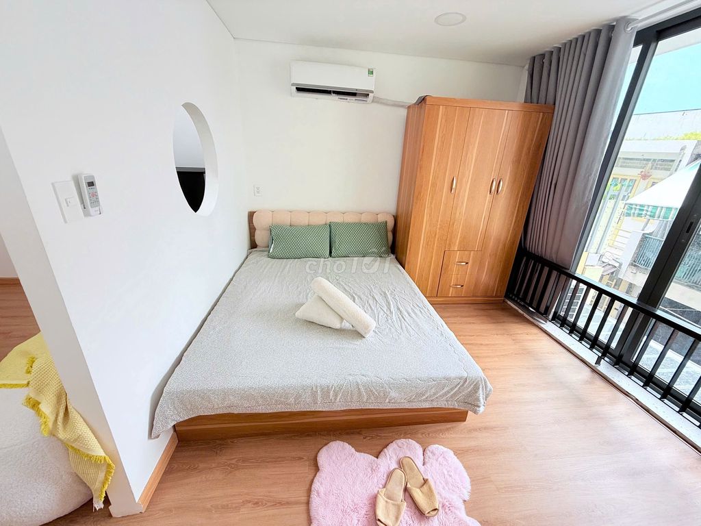 A kitchen room with a private washing machine.
