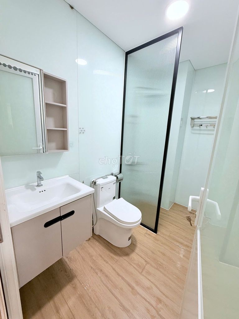 A kitchen room with a private washing machine.