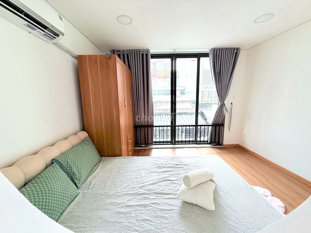 A kitchen room with a private washing machine.