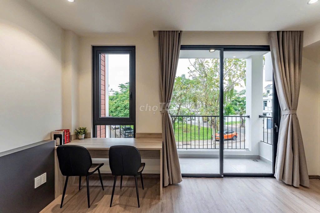 The balcony studio plus the open window, the full interior right next to the law college