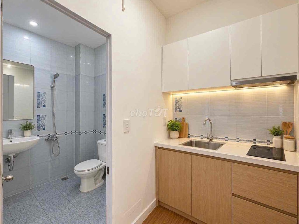 The studio apartment is 100 percent new interior next to the market.