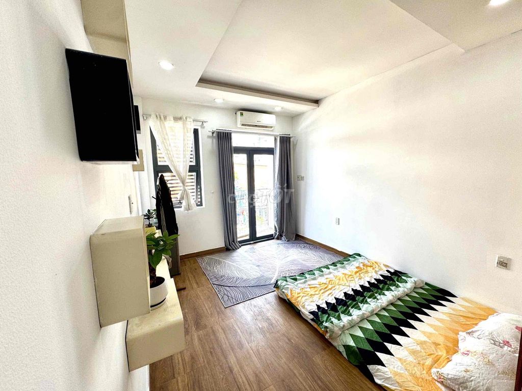 The balconies' studio is full of furniture - near the dragon chain
