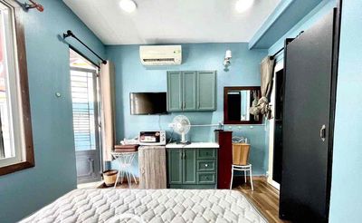 Rent the balcony window studio full interior at the heart of District 1.