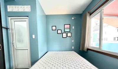 Rent the balcony window studio full interior at the heart of District 1.
