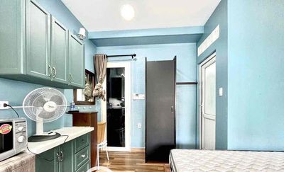 Rent the balcony window studio full interior at the heart of District 1.