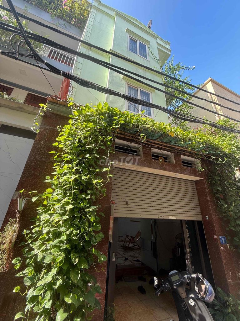 Three stories up the alley.