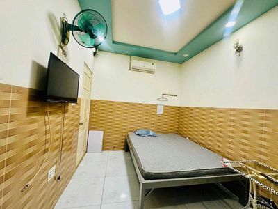 Cheap hotel suite on the street near a church-steal missile.