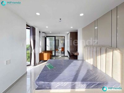 A bedroom near a balcony bridge, nice, open interior.