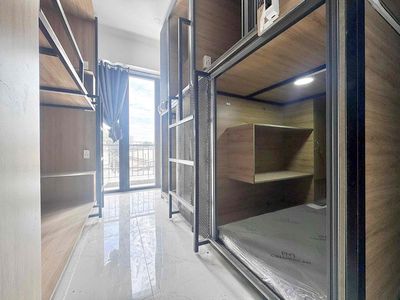 Close to Ho Chi Minh City Tech -- sleepbox is 100 percent new -- elevator + balcony.