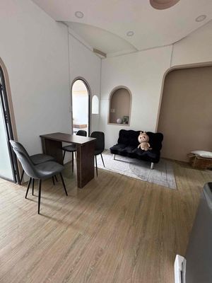 Two balcony bedrooms. Full wash-house.