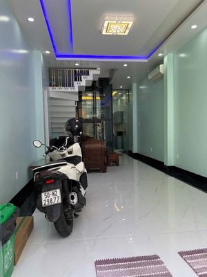 The rental house for Bình Phú, District 6, 4 x 15 meters, 3 floors, 4 bedrooms, elevators.