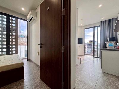 One bedroom, the balcony surrounding the house in downtown District 3.