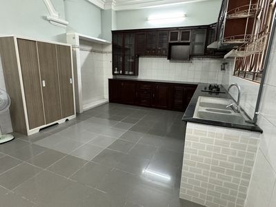 The room is wide, in the Bình Lợi villa, full of furniture, right on the ground floor.