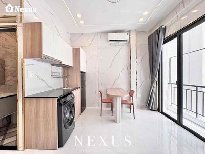 A mini apartment. A bedroom, a living room, full balcony furniture.