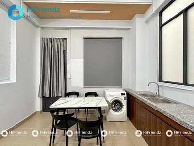 A super wide kitchen bedroom with private washing machines right through the flower village.
